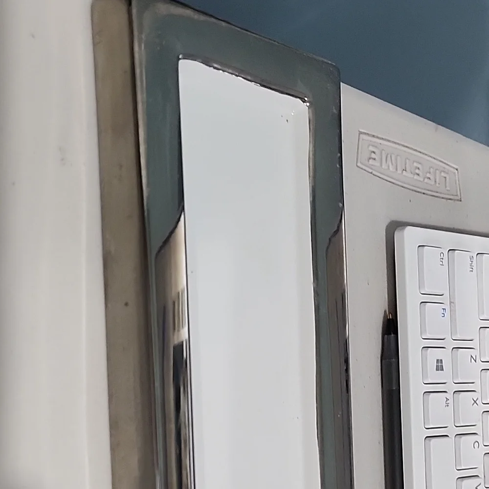 Modern White Keyboard with Metallic Highlights